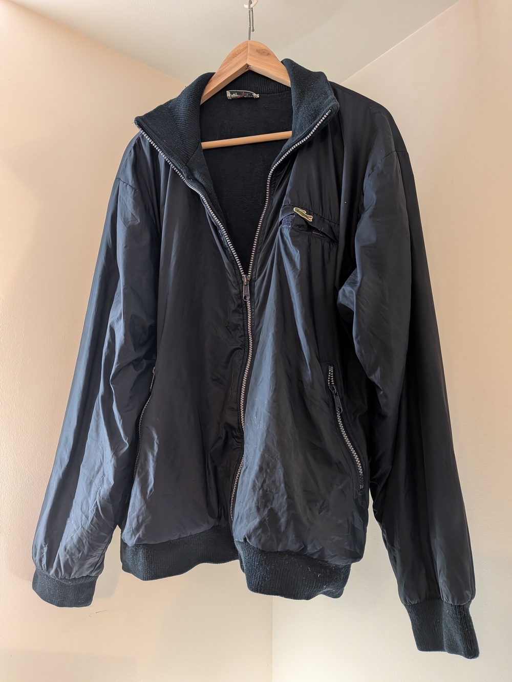 Vintage Lacoste Navy Men's Bomber Jacket with Zip Pockets